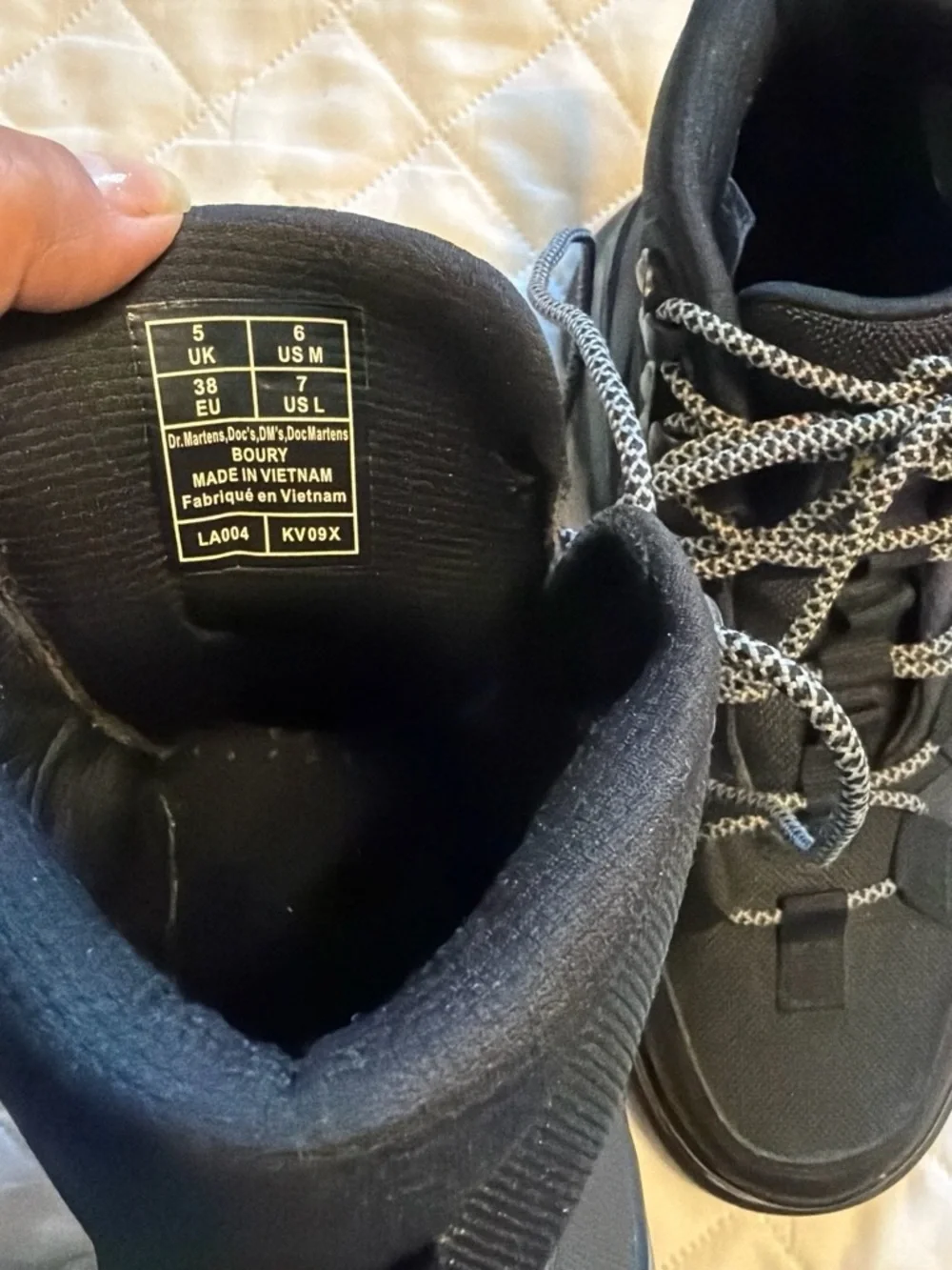 Dr. Martens Black Lug-Sole Hiking Boots with Yellow Stitching